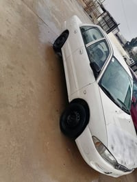 ٢٠٠٤ • توماتيك • أربيل