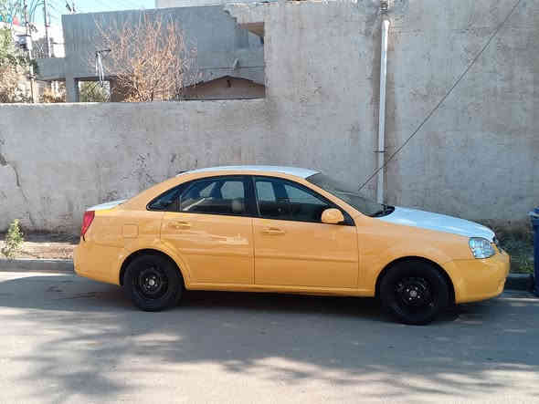 وبتره شركه عامه سياره بلاديه 2012 لا ضربه ولا صبغ بس جملغ امامي مبدل بلادي كير مكينه خير من الله كير عادي تخم تاير صدر امامي خلفي جديد  دوشه جديده تريك لبصره ما مشيه هواي  مكاني بغداد حي لعلام*********** سعر 65بيه محال
