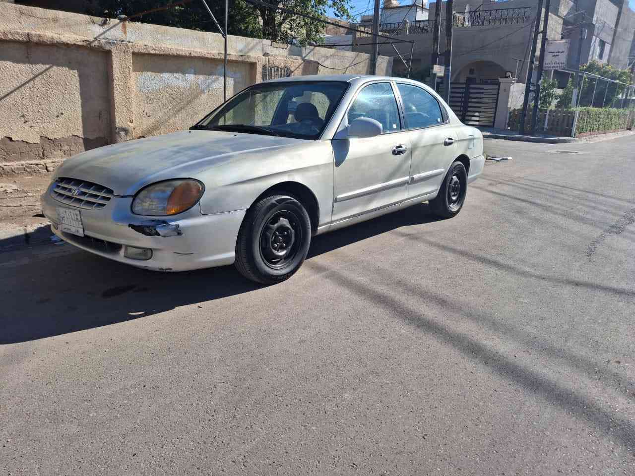 سلام عليكم سونتا منغولي موديل ٢٠٠٠  رقم بغداد بسمي مكينه ٢٠٠٠ صدر امامي خلفي نضيف مابيه ضربه قويه السياره مكينه ككير تبريد كله جديد فقط جارده السياره  السعر ٤٣ وبيه مجال مكاني بغداد حي الجهاد *********** فقط اتصال
