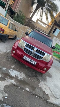 دوج نترو 2007 بيهة صبغ باب الصندوك وجاملغ ايسر الخلفي  مكينه وكير مضبو...