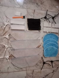 ملحقات مكنسة روبوت