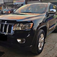 جراند شيروكي • ٢٠١١ • ضرر امامي