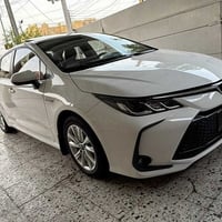 كورلا هايبرد موديل 23 ماشيه 33 الف مكفوله جاهزه من كل النواحي السعر 21...