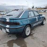 مازدا 323 • ١٩٩٢ • رقم كركوك