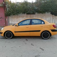 كيا ريو • ٢٠٠٨ • رقم بغداد أنكليزي