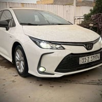 كورلا 2025 هايربد سياره كفاله ماشيه 13 رقم بغداد فقط بيه ملاحظه بسيطه ...