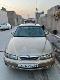 مازدا ١٩٩٧ • قفل مركزي • سنوية لحد ٢٠٣٠
