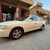 07706474555 سيارة ازيرة  2008 خليجي  مبدل جاملغ وباب اليمين  رقم بغداد...