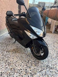 TMAX 2011 • ماشي ٣٧٠٠٠ • كفالة عامة