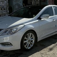 أزيرا 2013 السيارة فول مواصفات  بنوراما بصمه كشن جلد داخل قرميدي مساج ...