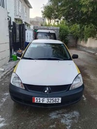 لانسر 10 • مكينة 2000 • رقم بغداد
