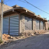 هيت حي المعلمين • محلات واجهة • ١٧٠م٢