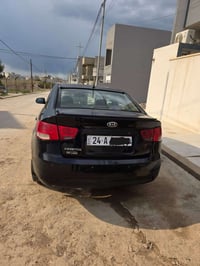 كيا سيراتو 2012 بدون ضرر بدون صبغ رقم دهوك موصفات عاديا سعر 105 و بيها...