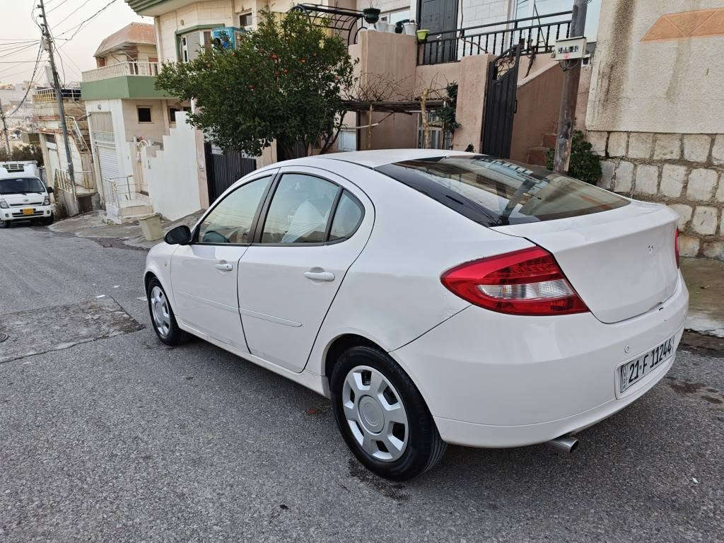 پڕۆتۆن ٢٠٠٩ 
سەیارەکە زۆر مەزبوتو بێ تەقەوڕەقەیە 
٤تایەی تازەی لەژێرایە گێڕو مەکینەو تەقەوڕەقە بەشەرت
سەنەوی و ڕەقەموهەموشتێکی تازەیە 
٣ پارچەی بۆیاخە 
سەیارەکە بەس ماشەڵای ئەوێ 
سعری ٥٧ گەڵا
*********** السليمانية, العراق
