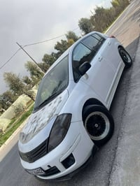 نيسان تيدا • 2011 • فل