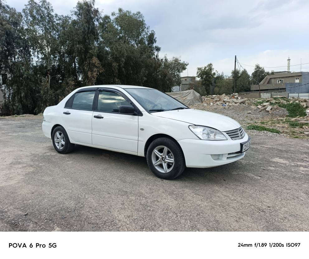 لانسر موديل 2010كير تؤماتيك
مه كينه گوره كيرو كه كينه به شرت
رقموو سنه وي نويه به ناوي خؤمه 
6بارجه سبوغه جه مبيكي پشتي 
هه يه قباغ جاملغه كي كؤرايه 
سحر 62ورقه و مجال*********** أربيل, العراق
