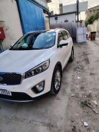 سورنتو 2016 السيارة كانت مضمومه  فول 1/1 للأخير بعد سلفون الشركة داخل ...