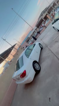 وبركاته كورلا نحله 2006لون ابيض ضررها جمالغ من جهه السايق وباب جهه ساي...