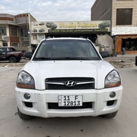 توسان 2010  مكفوله كفاله عامه من الصبغ والضربه والبارد  بيها ملاحضه بس...