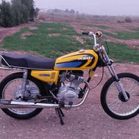 دراجة نارية • أوراق سكنر