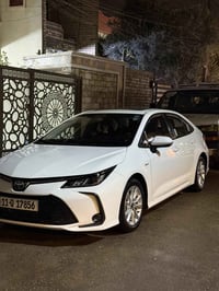 كورلا 24 هايبرد ماشيه 53 الف كفاله من البارد والصبغ رقم بغداد باسمي فو...