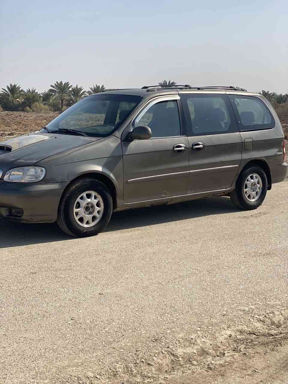 للبيع كيا كرنفال                    مديل ٢٠٠٠ السياره جاهزه من كلشي حداديه كير محرك السياره عل البلاد دواخل وگشر لاصبغ لاتبديل السعر ٦٥ مع المجال مكان السماوه ***********
