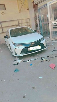 العنوان بغداد الغزاليه  سياره خصوصي كورلا 🚕 2025  توصيل بريد 🪪 وتنقل ب...