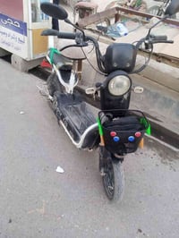 دراجه شحن 4بطاريات نظيفه امانت الله كلهه شغالا وكاملا حجم 14 اريد مراو...