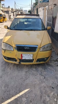 سياره شيري كوين موديل ٢٠١٠ رقم بغداد   كير ومحرك كورله السياره جاهزه ك...