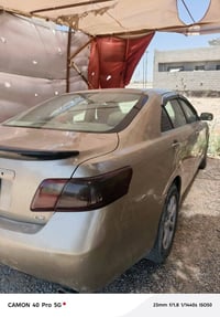كامري ٢٠٠٧ • وارد أمريكي • باب السائق متضرر