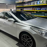 هونداي ازيرا 2013 مغلفة بالكامل ppf لون سلفر امريكي ماشية 160 الف وقاب...