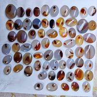 عقيق يماني • ٦٦ قطعة • متوسطة وخشنة