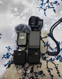 كامرا بوكت ٣  السعر ٤٥٠ الف مع مايك  الجهاز المايك بي ميسجل الخاص بي م...