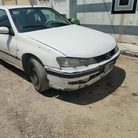 بيجو 2001 • محرك كورلا 16 • فول توماتيك