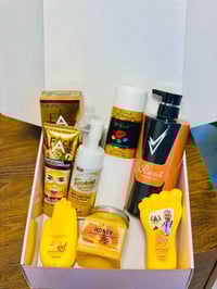 طقم جسم ووجه • قناع ذهب • مقشر ومرطبات