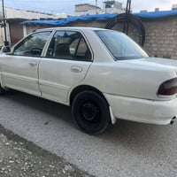 بروتون ٢٠٠٤ • السليمانية • بدل