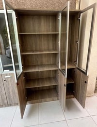 دولاب خشب وزجاج جديدات عدد 2 يحتوي الدولاب الواحد على 6 ابواب تستخدم ا...