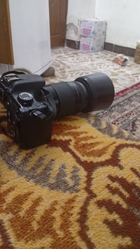 كانون • زووم ٧٥-٣٠٠ • رمادي كيلو