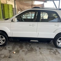 كيا سبورتج 2009 بدون صبغ البابين بيها تعديل بادر بسيط جداً خليجي ،فتحة...