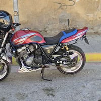 سي بي ٤٠٠ • مرقّم • كوت دهل