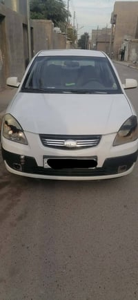 كيا ابرايد موديل 2009 نضيفه حيل بيها طخه بل جاملغ ومعدل عل بارد السيار...