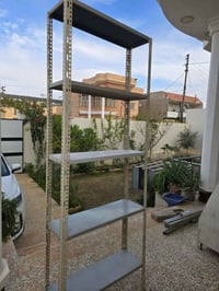 مكلف به النشر رفوف محل البيع زائد ميز كما موجود بصوره الاتصال 07735953...