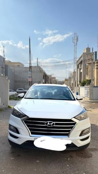 هونداي توسان خليجي  موديل ٢٠٢٠ الكاصد   رقم بغداد الماني بسمي   لون اب...