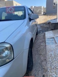 شوفر ليت أوبترا مديل 2013 الضرر قطعتين   رقم ساقط و سنويه    و بيها نف...