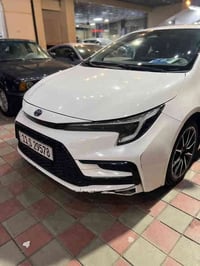 كورلا  2023 هايبرد صيني  (شكل الامريكي ) سياره مكفوله كفاله عامه  ماشي...