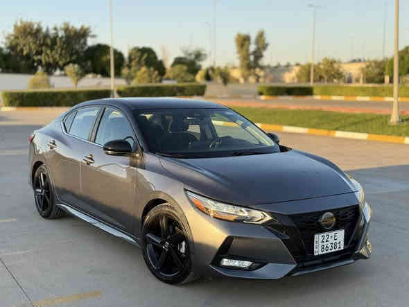 نيسان سنترا SR2023 (توكلر midnight ) 🚘
الموديل: 2023
الصنف: SR MIDNIGHT 
المحرك: 2000cc – بنزين – 4 سلندر
الوارد: أمريكي ✅ ( صبغ  شبر في جاملغ امامي اليمين وبنيد مبدل بلادي بدون صبغ )

✅ جميع الأيرباكات أصلية ✅ (شرط الفحص)

ملاحظة: تخم تاير جديد هونكوك وباتري

 • رقم الشاصي: 3N1AB8DV4PY223907

 • اللون الخارجي: نفطي
 • اللون الداخلي: شمواه أسود 
 • عداد: 11000 ميل

⸻

السعر 💰15900 $ (159$ )

قابل للتفاوض بعد المعاينة فقط – لا يوجد تفاوض عبر الهاتف

⸻

المواصفات ⭐
               • سقف اسود بلادي midnight 
 • تشغيل بصمة + بصمة أبواب
       ٠ تشغيل عن بعد
 • شاشة وسطية مع نظام أبل كار بلاي
 • كاميرا خلفية + كاميرا أمامية (مساعدة الحفاظ على المسار)
 • رادار خلفي للوقوف المفاجئ
 • حساسات جانبية في المرايا
 • نظام تحديد مسرب + قيادة شبه ذاتية
 • مثبت سرعة + تحكم ستيرن
 • بلوتوث
 • حجر بيئة بلادي
 • ويل كاب SR 
      • ضو امامي وكشاف زنون اصلي
⸻

📍 موقع السيارة: أربيل
📞 للاستفسار: *********** (اتصال / واتساب / فايبر)
