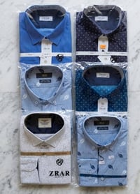 اتشكيلة مميزة من القمصان الرسمية بتصاميم أنيقة تناسب العمل والمناسبات ...