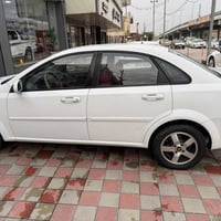 اوبترا ٢٠١١ لون ابيض رقم انبار حره حره !!!؟؟ صبغ فقط بنيد  شاصي دواخل ...