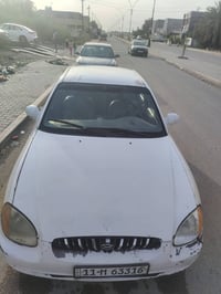 سوناته 2001 للبيع كير ومكينه مكفولات  تبريد كنبريسر شغال بس شبي مشكله ...