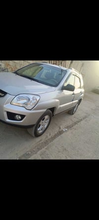 كيا سبورتج 2009 رقم دهوك الجديد كوبون موجود مابيها اي صبغ السيارة مال ...